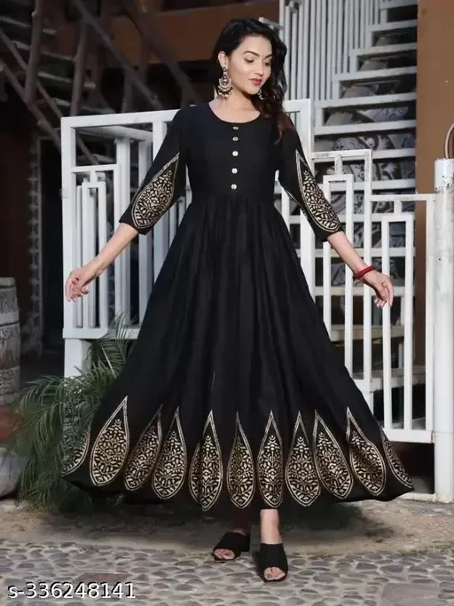 A Gold printed kurti for women is a beautifully designed ethnic garment